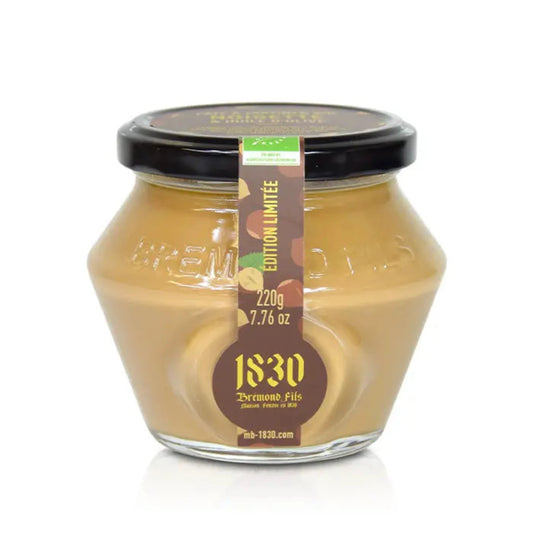 Ein Glas Bio-Haselnusscreme mit Olivenöl von Maison Brémond 1830, 220 g, mit nachhaltigen Zutaten.