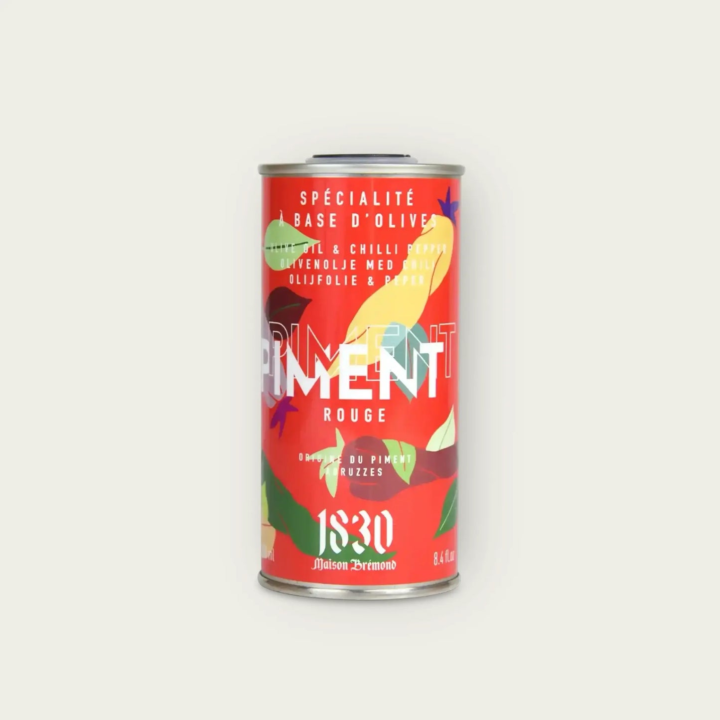 Maison Brémond Chili-Olivenöl 250 ml – Intensiv gewürztes Olivenöl in einem markanten roten Kanister mit buntem Design, stilvoll vor neutralem Hintergrund präsentiert.