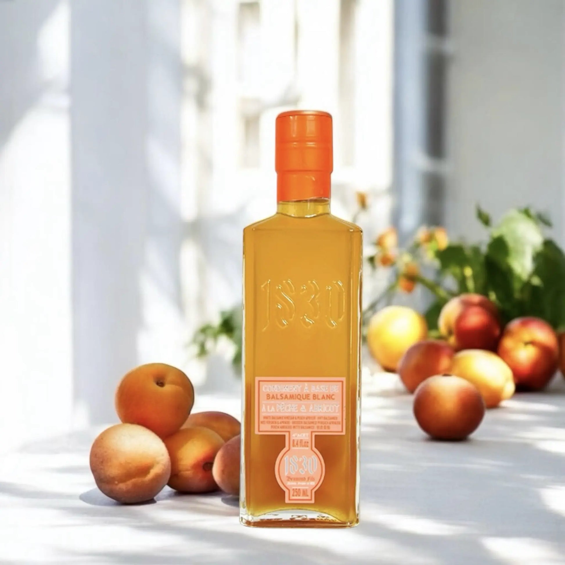 Pfirsich-Aprikose Essig Condiment 250 ml – Fruchtiger Genuss mit natürlichem Pfirsich- und Aprikosenaroma. Perfekt für kreative Feinschmeckerrezepte.