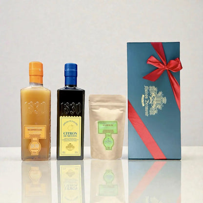 Geschenkset von Maison Brémond 1830 mit Zitronen-Olivenöl aus Menton, weißem Balsamico, Fleur de Sel und eleganter Geschenkbox mit roter Schleife
