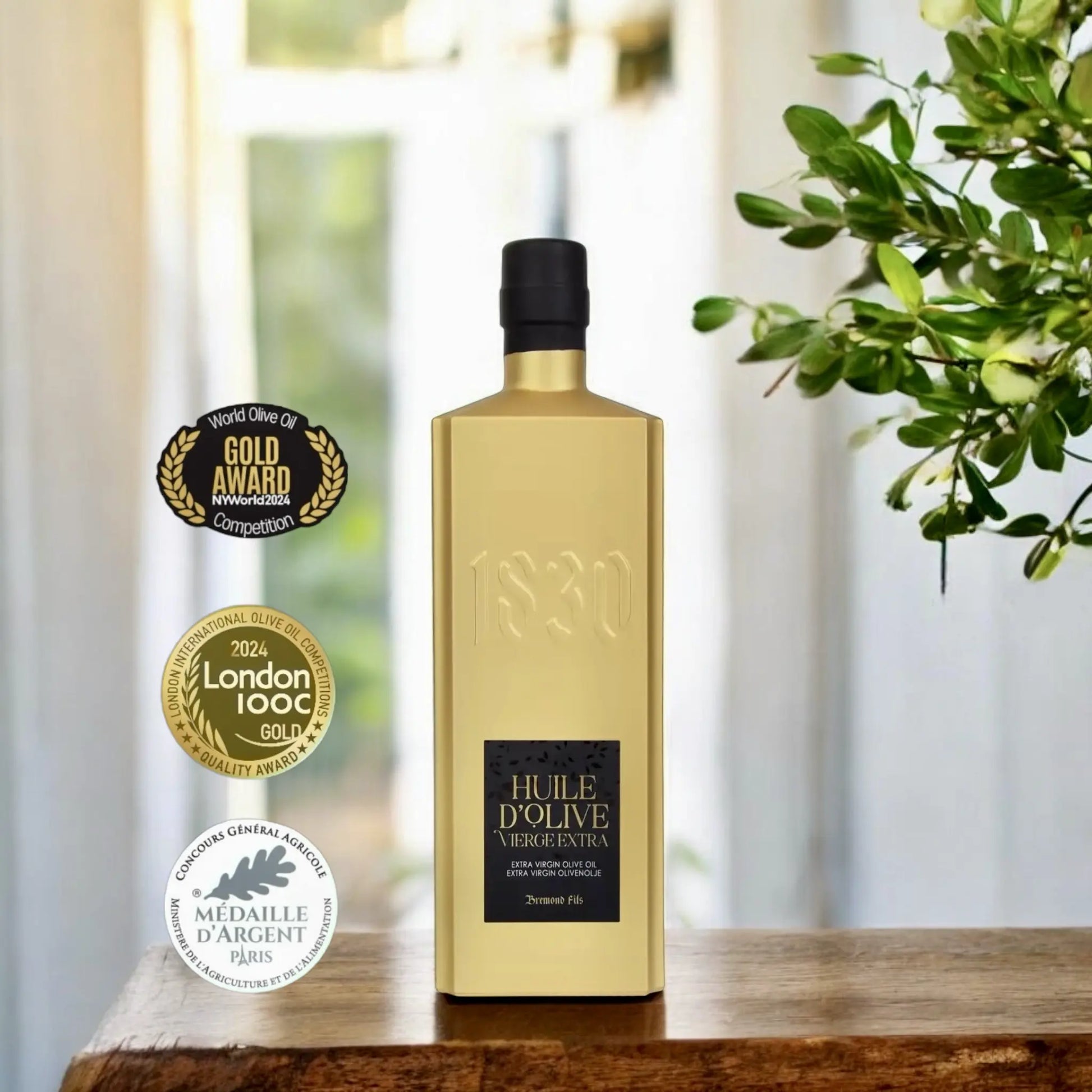 Hochwertiges Testsieger-Bio-Olivenöl aus Frankreich in luxuriöser goldener Flasche – prämiert mit renommierten internationalen Auszeichnungen für außergewöhnliche Qualität und Geschmack